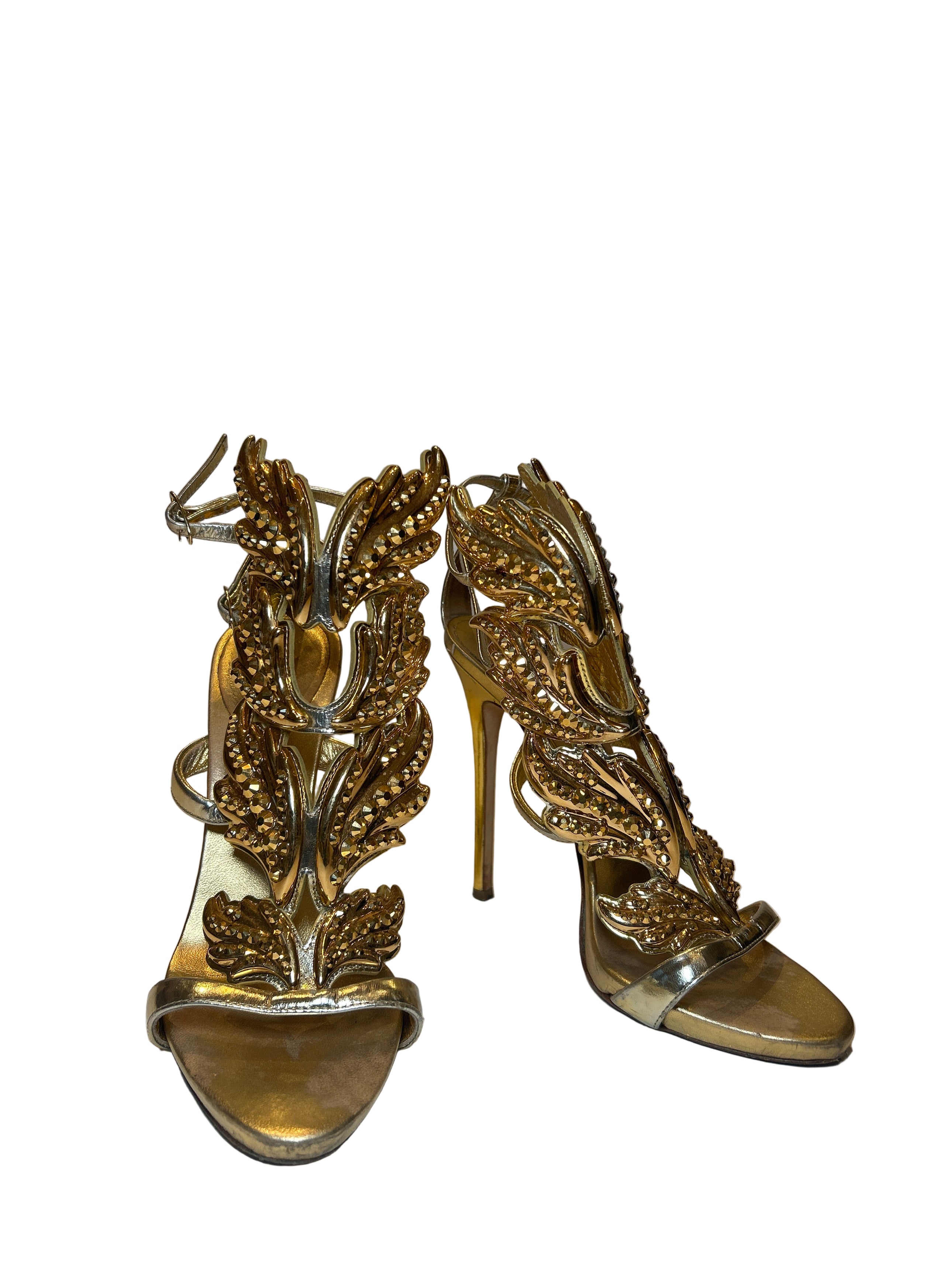 GOLD “CRUEL SUMMER” WING HEELS (AS IS) @AMCCORMICK