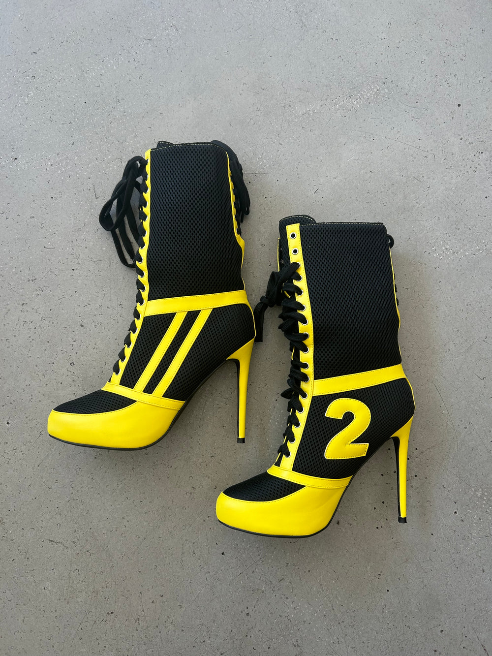 YELLOW LACE UP MOTO BOOTS