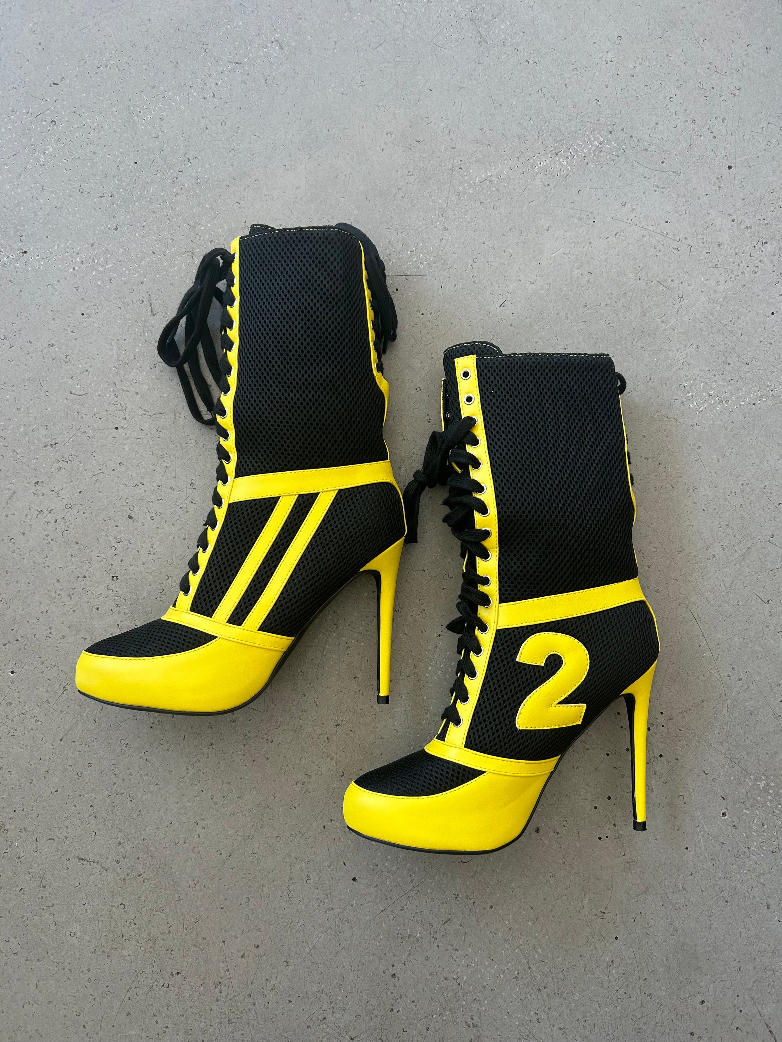 YELLOW LACE UP MOTO BOOTS